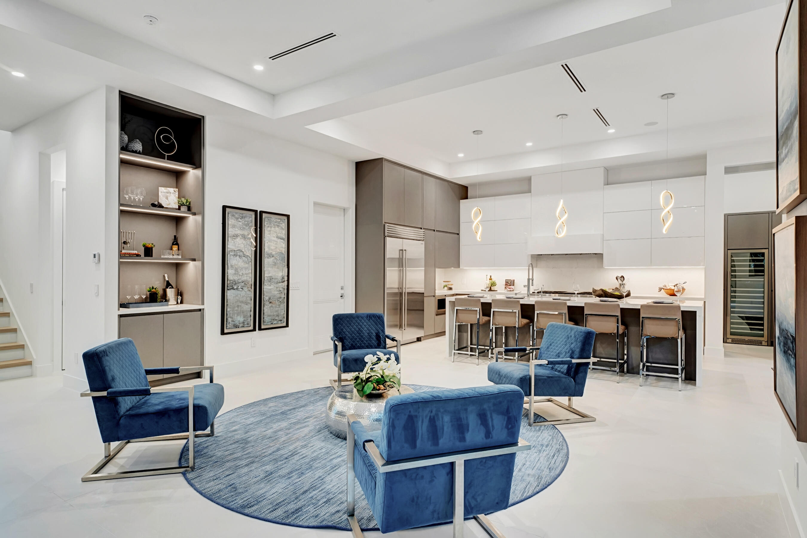 1133 Northeast 3rd Avenue Boca Raton, FL 33432 - Photo 14 of 38 a living room with furniture kitchen view and a dining table