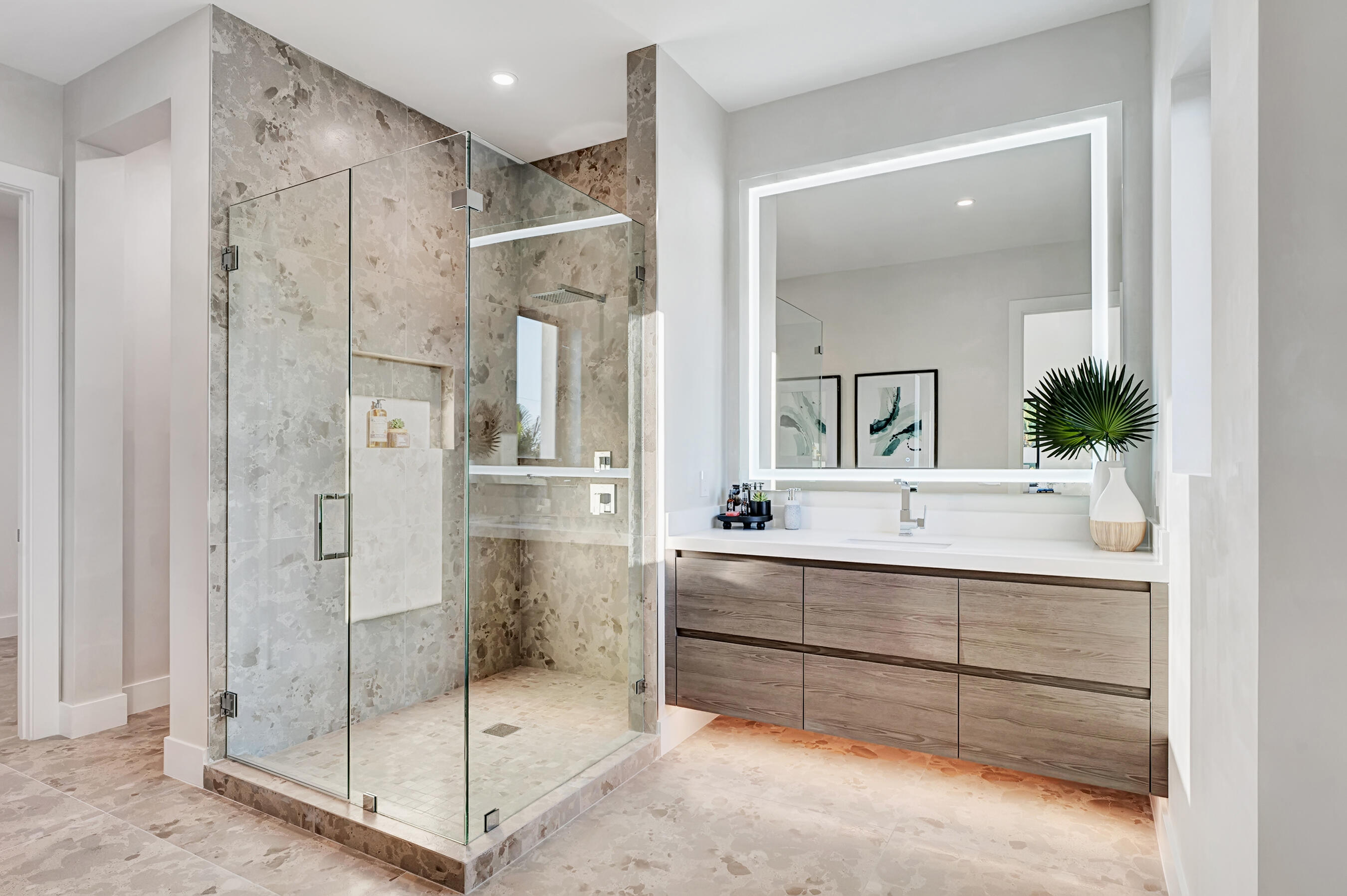 1133 Northeast 3rd Avenue Boca Raton, FL 33432 - Photo 16 of 38 a bathroom with a shower sink and mirror