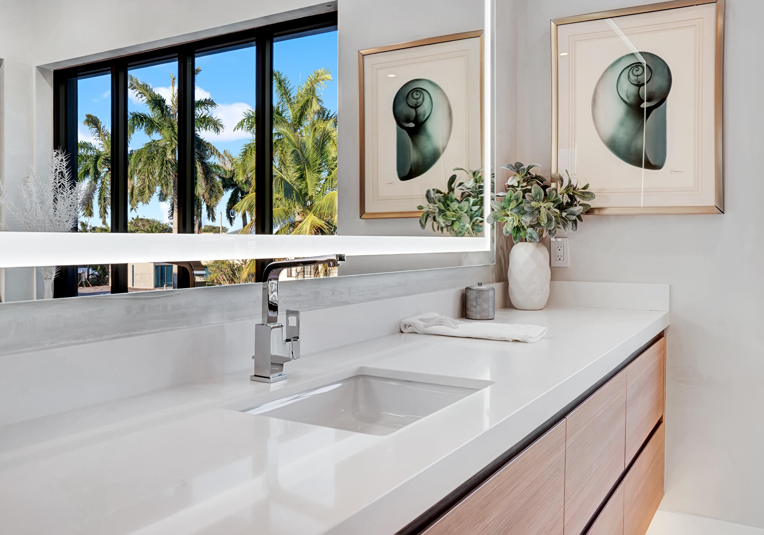 1133 Northeast 3rd Avenue Boca Raton, FL 33432 - Photo 21 of 38 a bathroom with a sink and a mirror