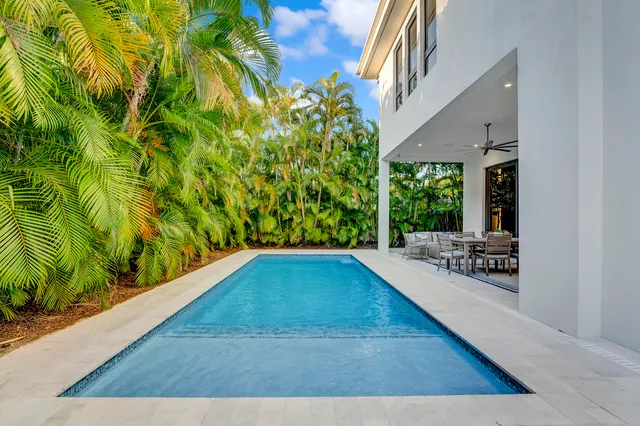 a view of swimming pool from a balcony