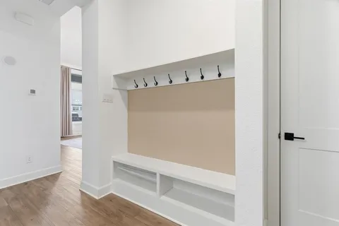 a view of kitchen with wooden floor