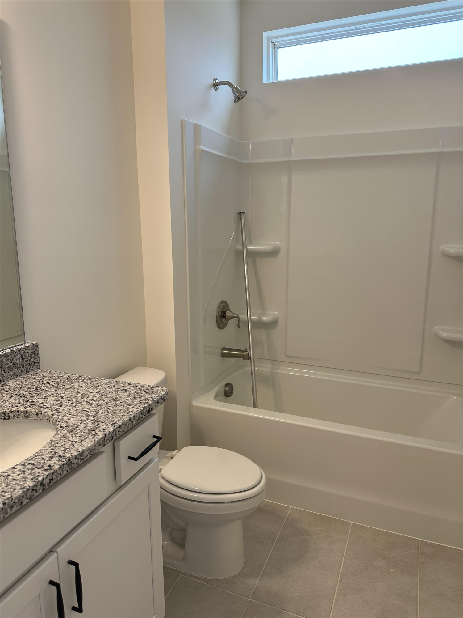 4432 Beckel Road Willow Spring, NC 27592 - Photo 5 of 22 a bathroom with a granite countertop bathtub shower sink vanity and toilet