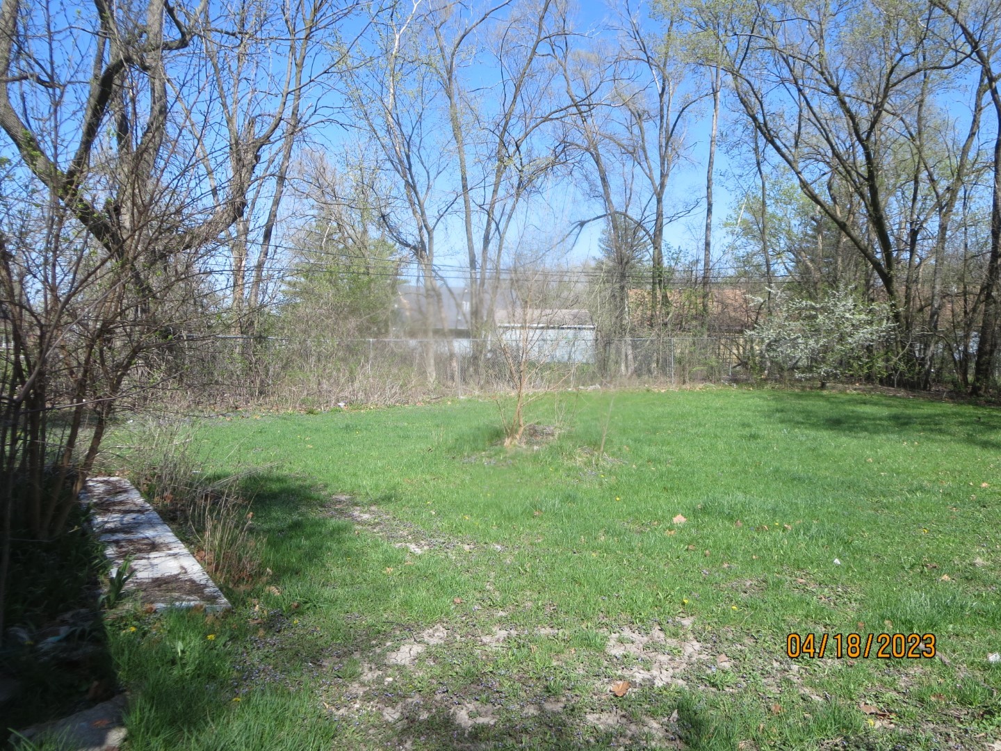 8 Allegheny Court Park Forest, IL 60466 - Photo 12 of 12 a backyard of a house with lots of green space