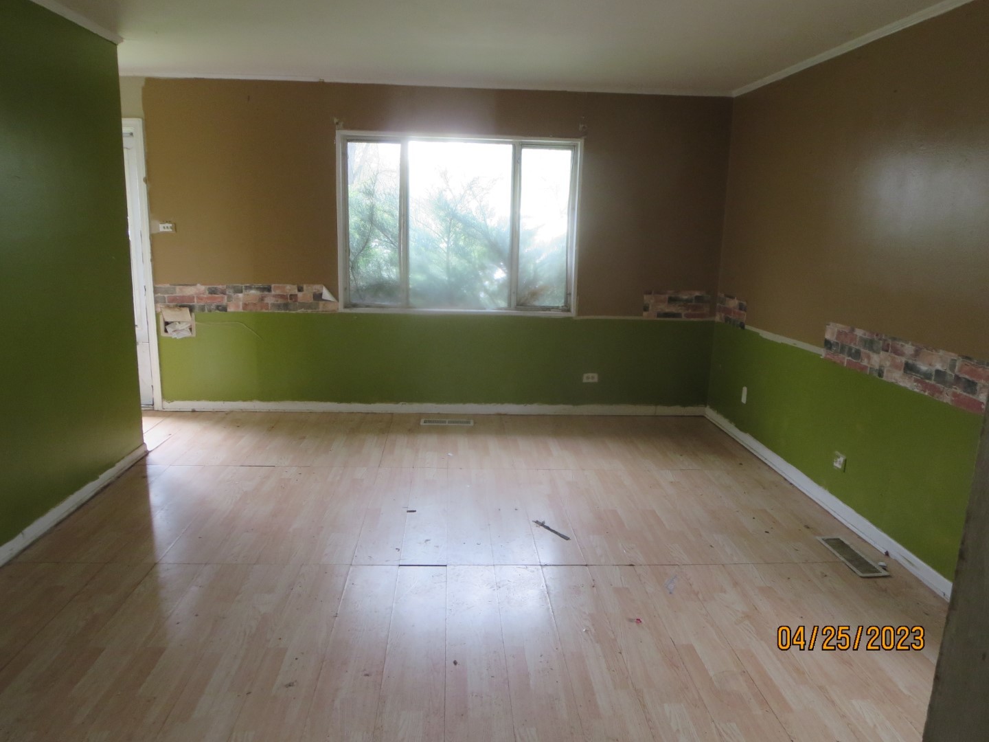 8 Allegheny Court Park Forest, IL 60466 - Photo 6 of 12 an empty room with wooden floor and windows