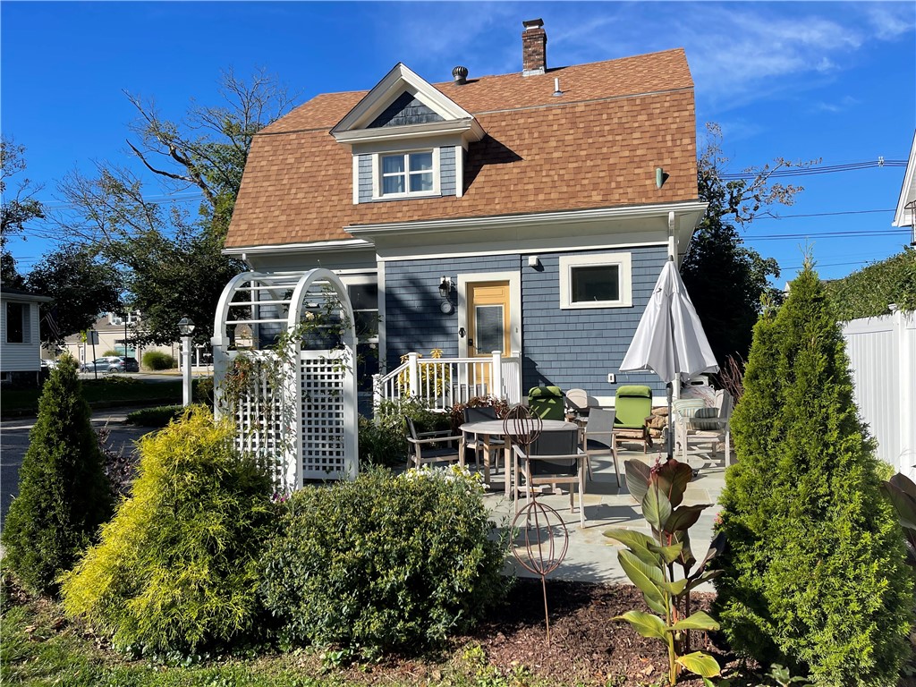 60 Beach Street Westerly, RI 02891 - Photo 29 of 36 Enjoy dining al fresco in your backyard oasis