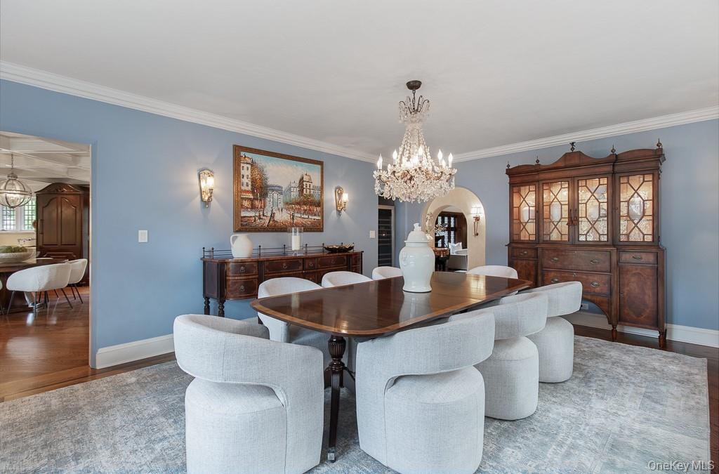 21 Hampshire Road Bronxville, NY 10708 - Photo 11 of 41 Alternative view of the formal dining room showcases the direct access from the dining room to the kitchen, an ideal setup for formal entertaining.