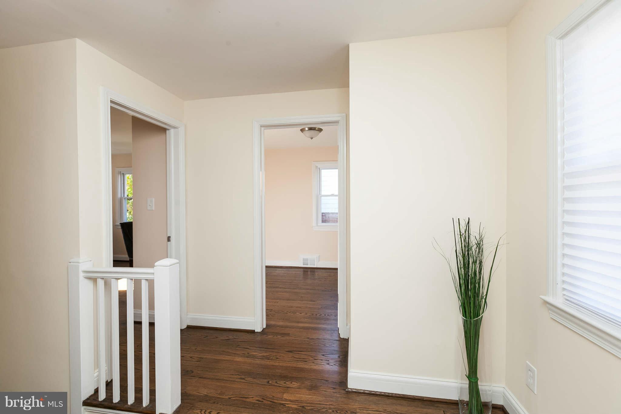 1316 East 35th Street Baltimore, MD 21218 - Photo 15 of 30 a view of entryway with wooden floor