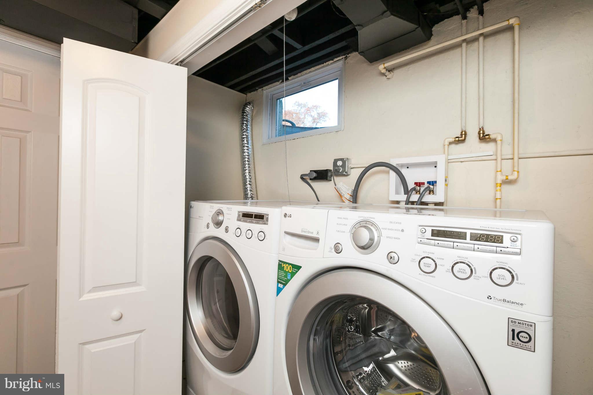 1316 East 35th Street Baltimore, MD 21218 - Photo 27 of 30 a utility room with dryer and washer