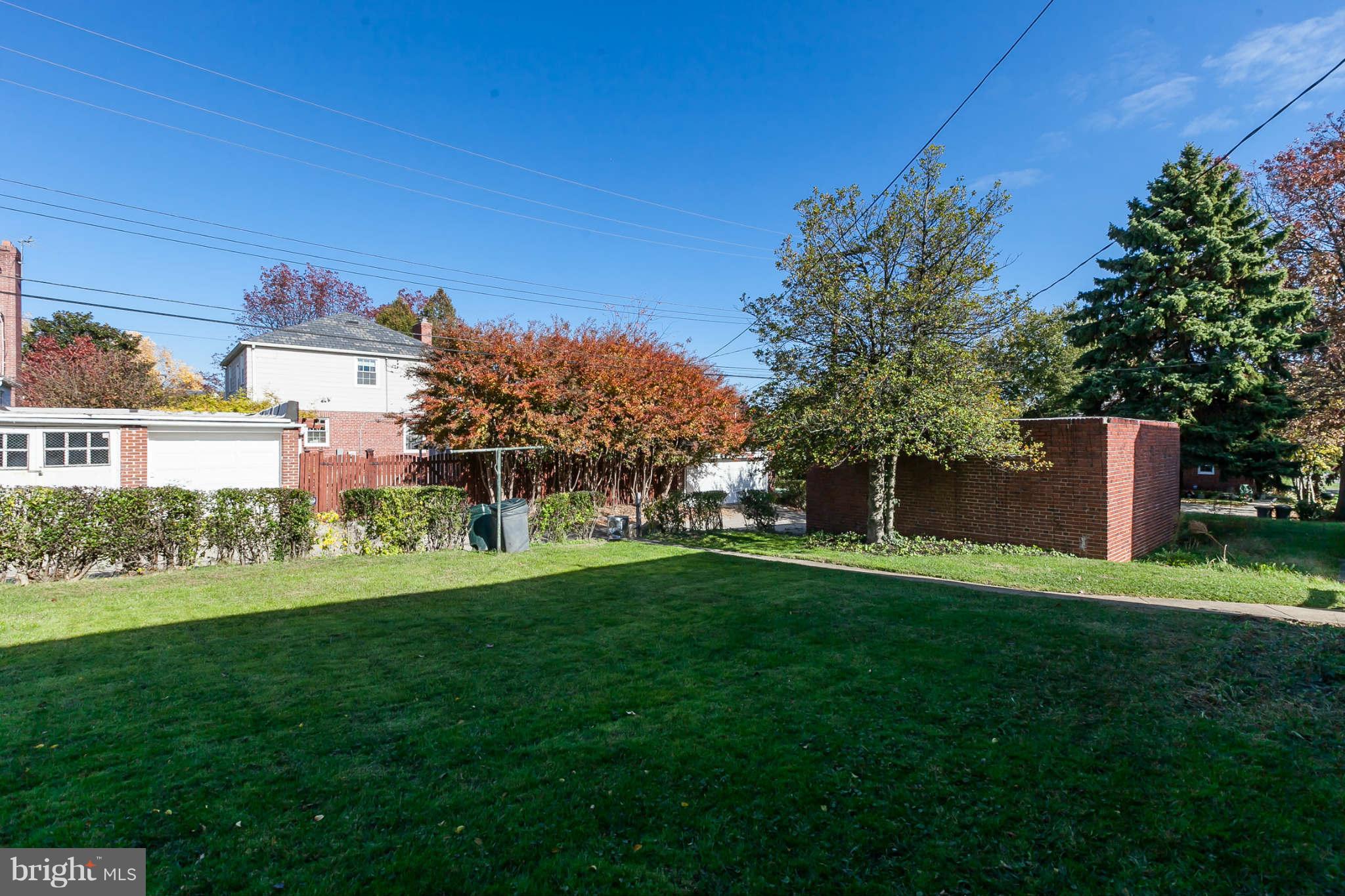 1316 East 35th Street Baltimore, MD 21218 - Photo 29 of 30 a view of a house with a yard