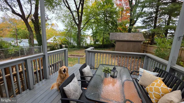 a bedroom with a bed dresser and a window
