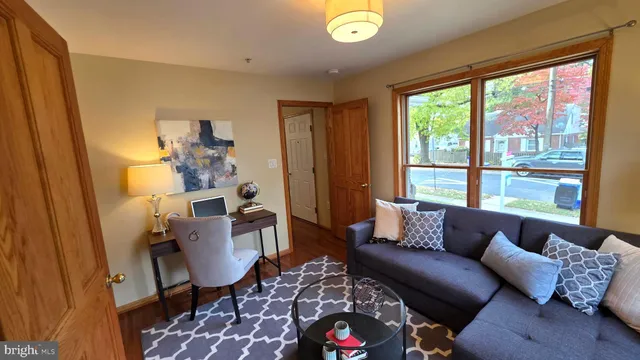 a view of empty room with wooden walls