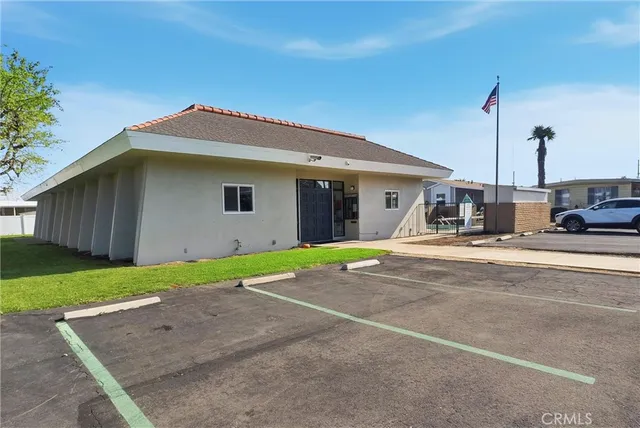 a house view with a backyard space