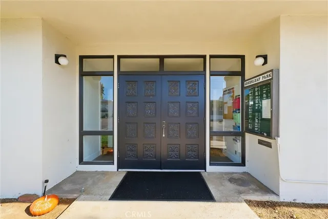 a view of a bathroom with a sink and a shower