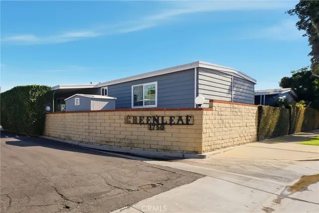 a front view of a house with a garage