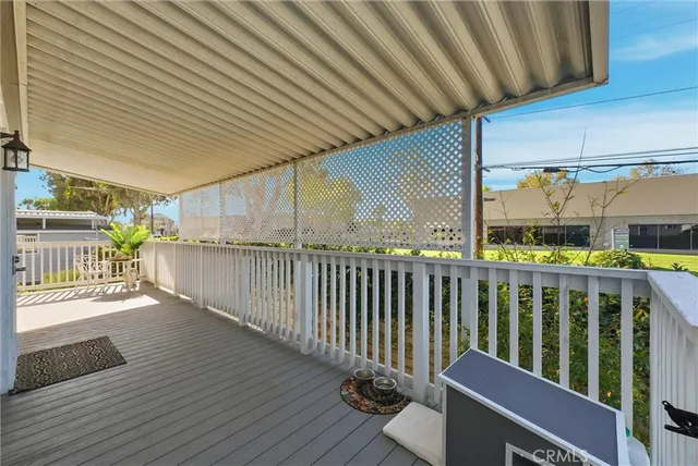 a balcony with wooden floor