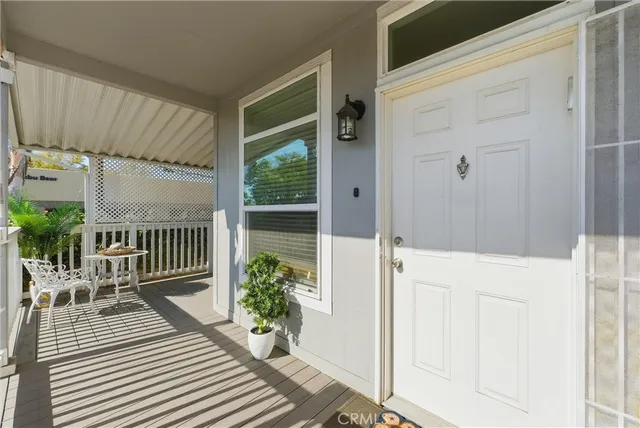 a view of balcony with furniture