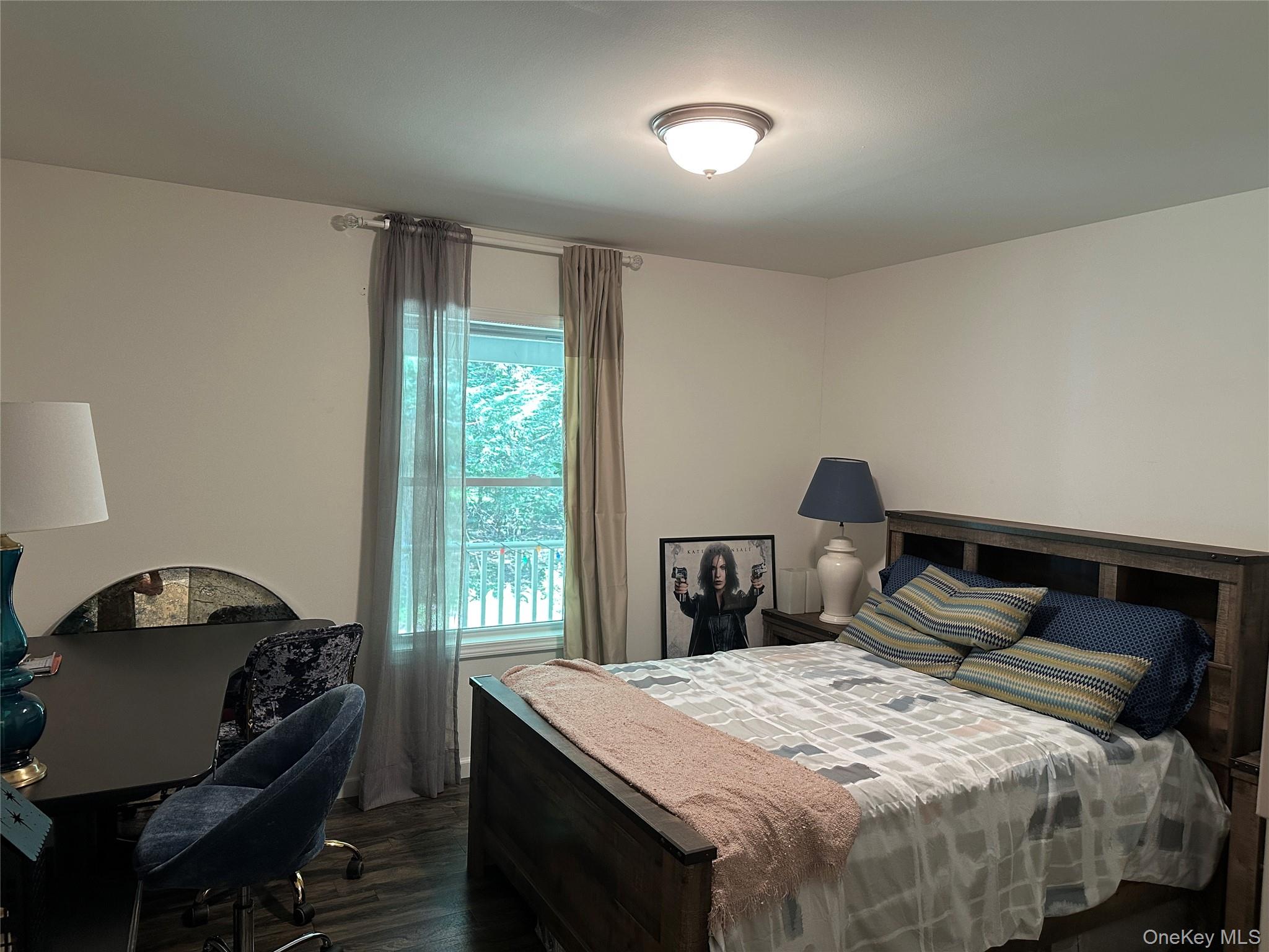 64 Schleiermacher Road Livingston Manor, NY 12758 - Photo 21 of 37 a bedroom with a bed and a window