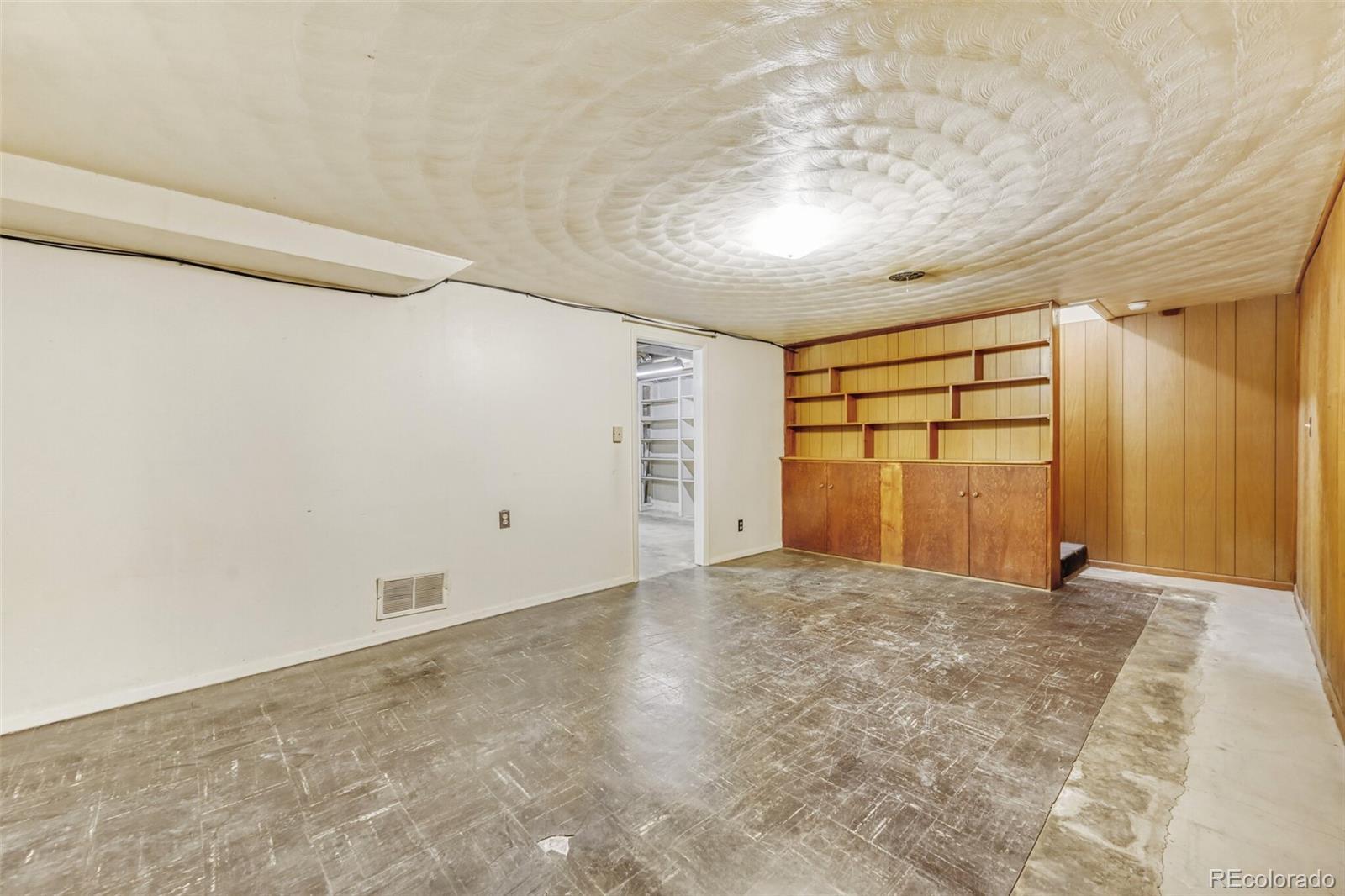 7850 Raleigh Street Westminster, CO 80030 - Photo 14 of 18 a view of an empty room with a window