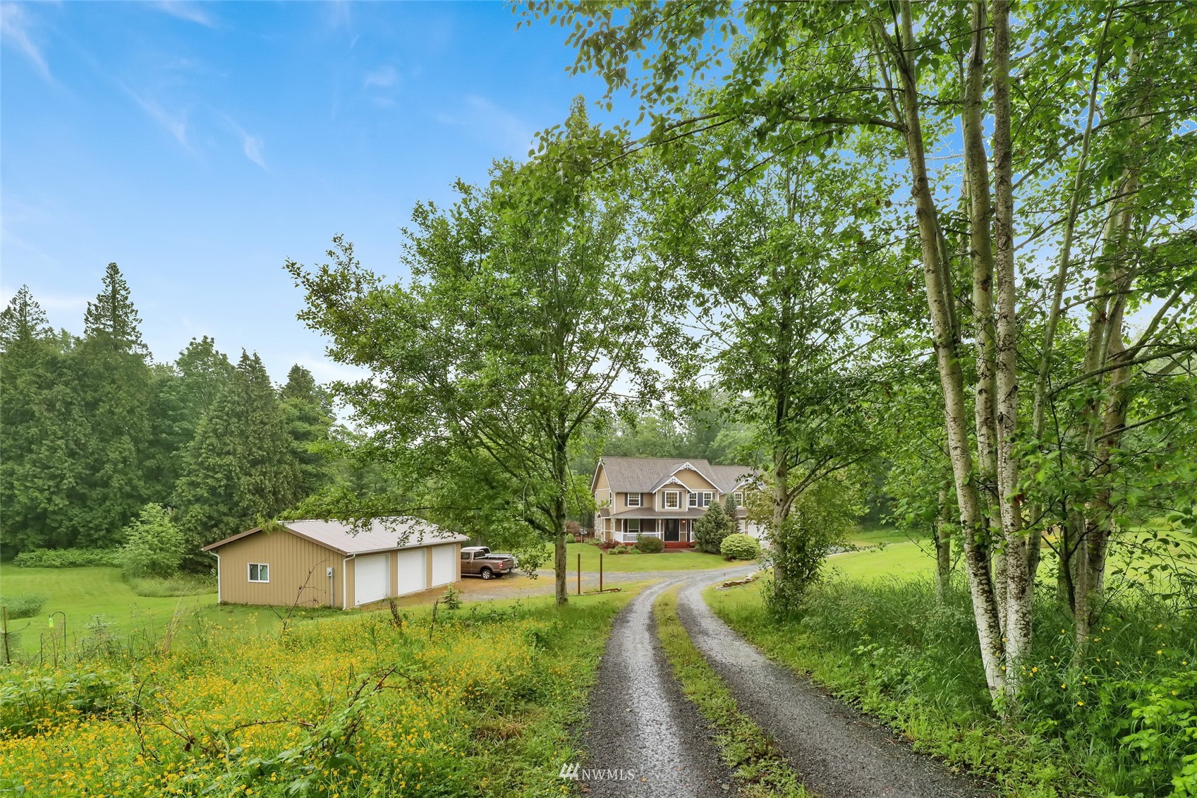 2708 Brown Road Ferndale, WA 98248 - Photo 5 of 38 a view of a garden with a house