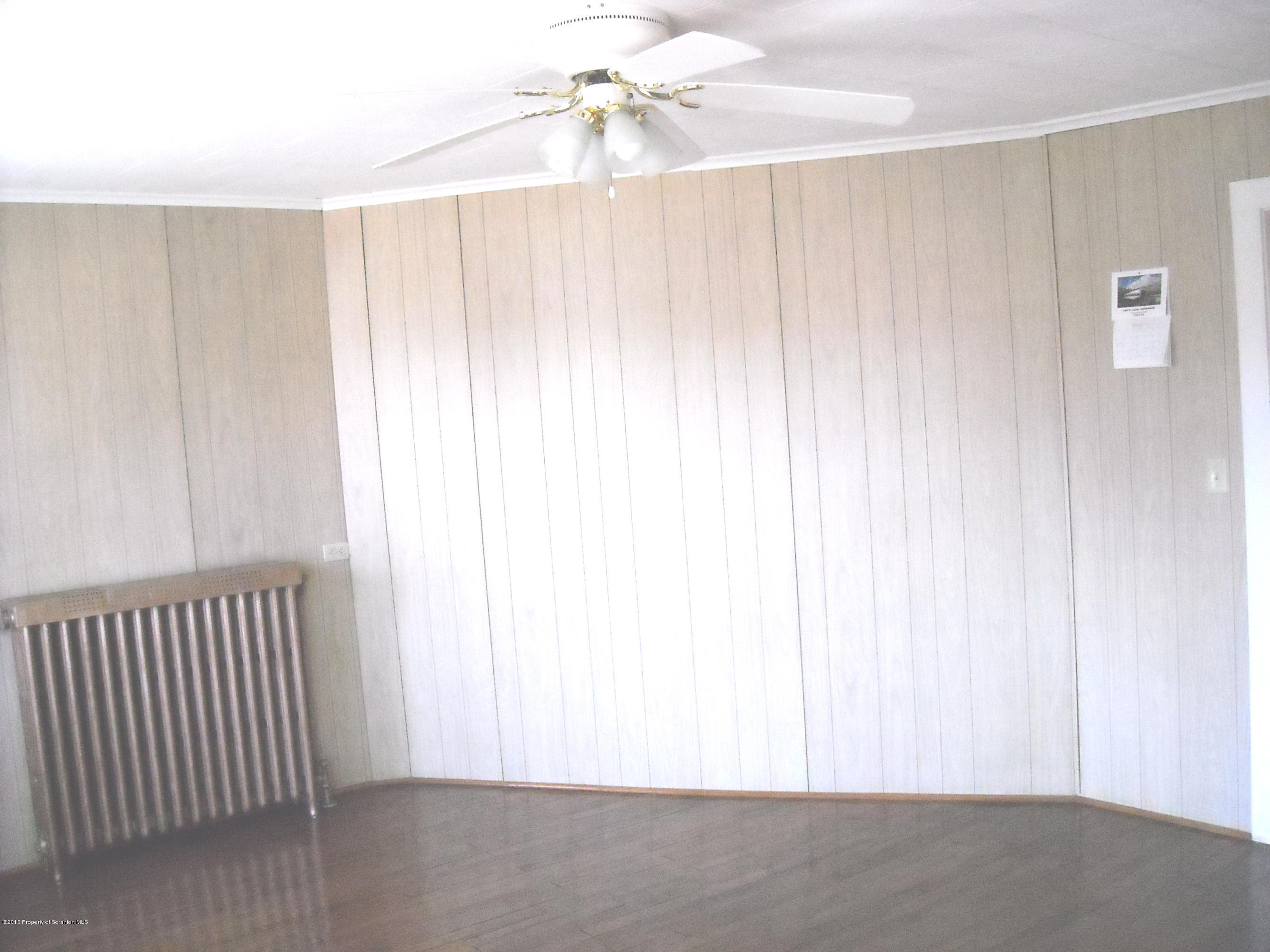 502 State Rte 92 South Tunkhannock, PA 18657 - Photo 36 of 52 a view of a livingroom with a ceiling fan and window