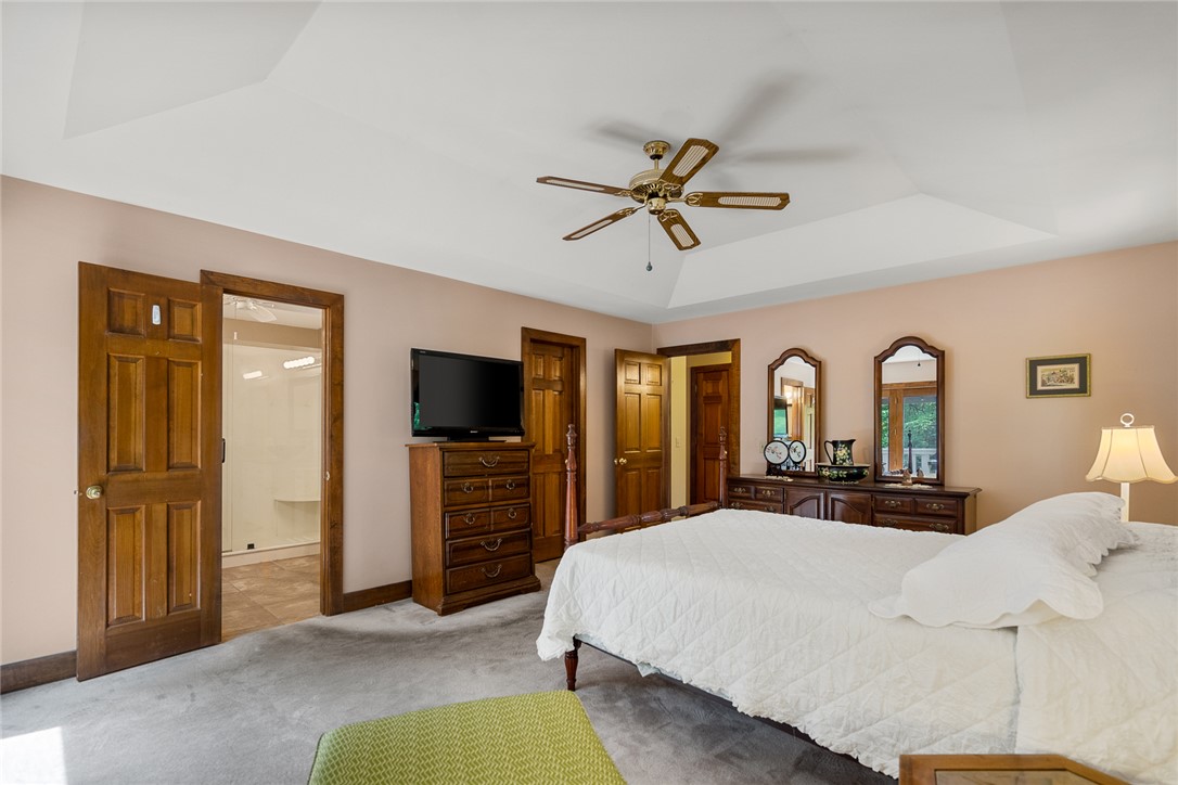 324 Hobson Road Anderson, SC 29621 - Photo 23 of 46 This spacious primary bedroom features a vaulted ceiling and direct access to a private bath.