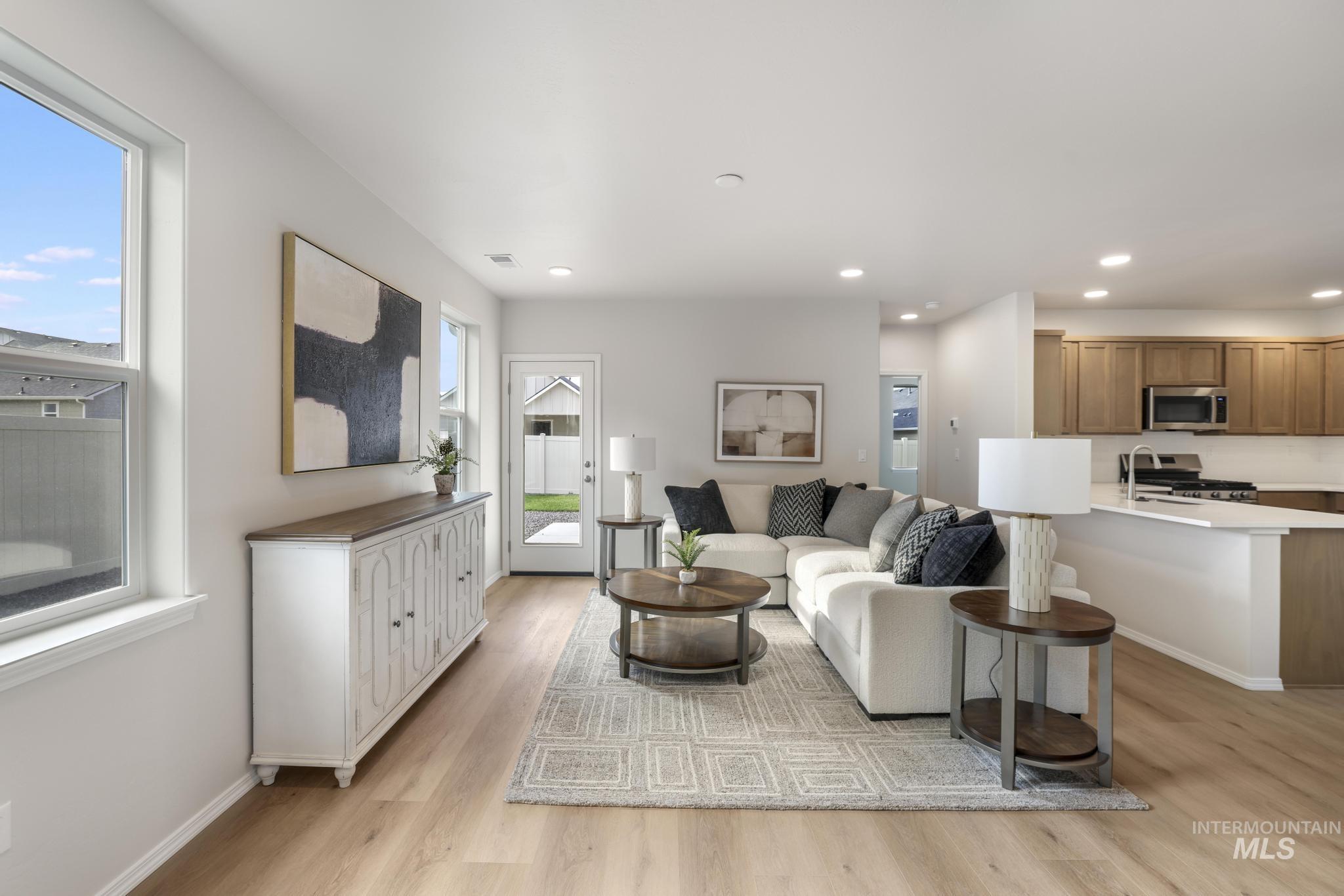 1542 Kenyon Road Twin Falls, ID 83301 - Photo 4 of 26 Living room featuring light wood-style floors and recessed lighting