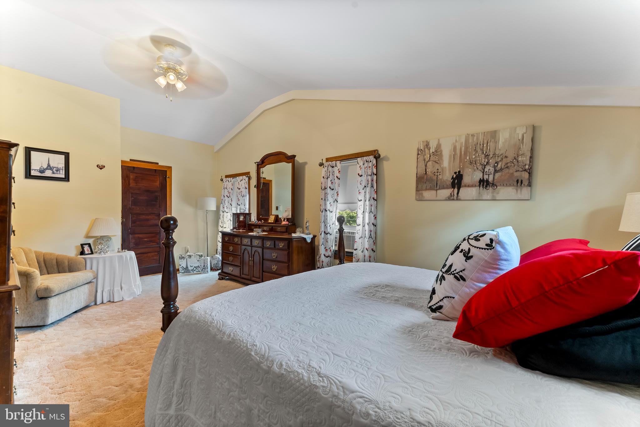 307 Lenox Road Havertown, PA 19083 - Photo 20 of 27 a bedroom with a bed and a chandelier