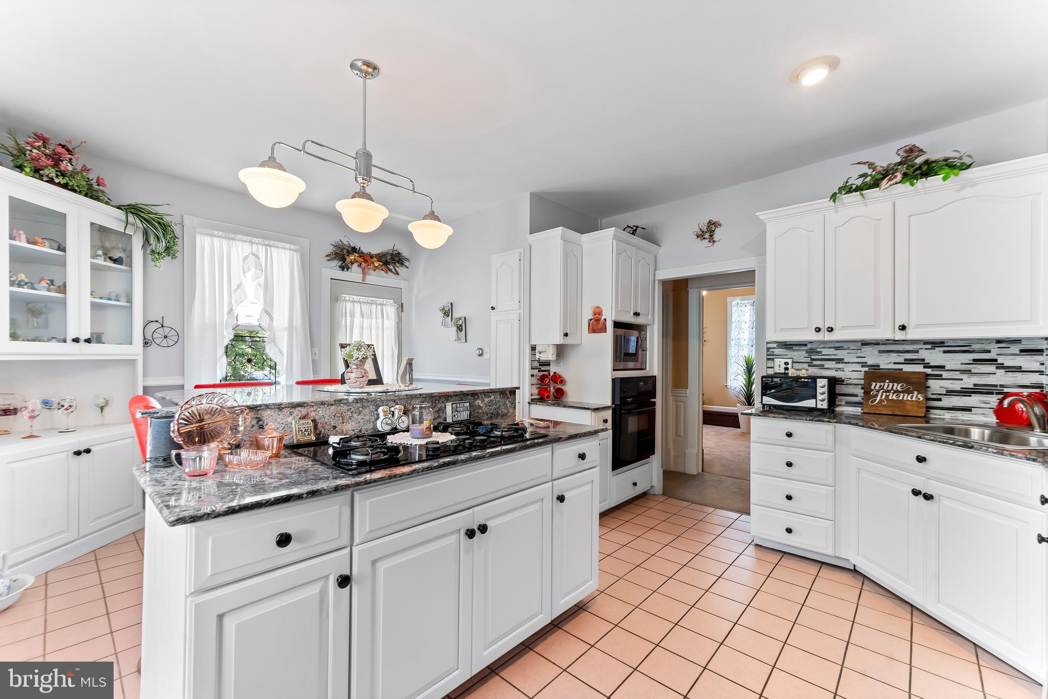 307 Lenox Road Havertown, PA 19083 - Photo 10 of 27 a kitchen with counter top space cabinets and stainless steel appliances