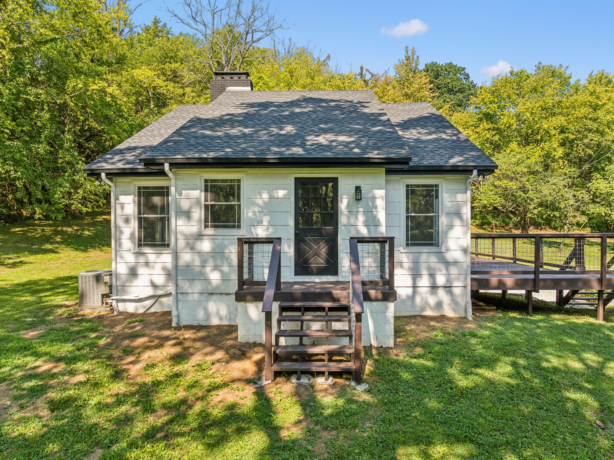 87 Gladdice Road Pleasant Shade, TN 37145 - Photo 2 of 47 a view of house with backyard outdoor seating and hardwood