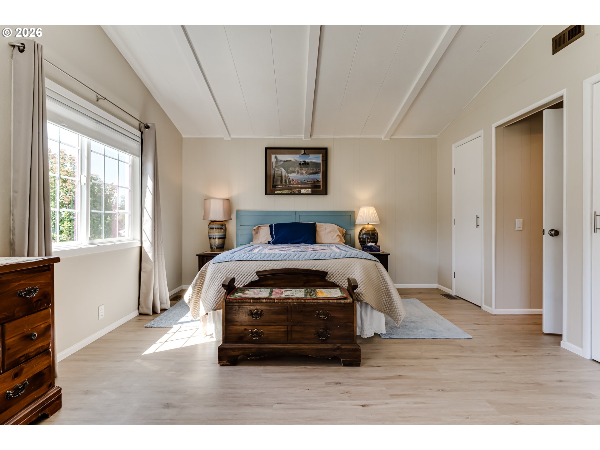 34681 Devonshire Drive Eugene, OR 97405 - Photo 20 of 34 a bedroom with a bed and wooden floor