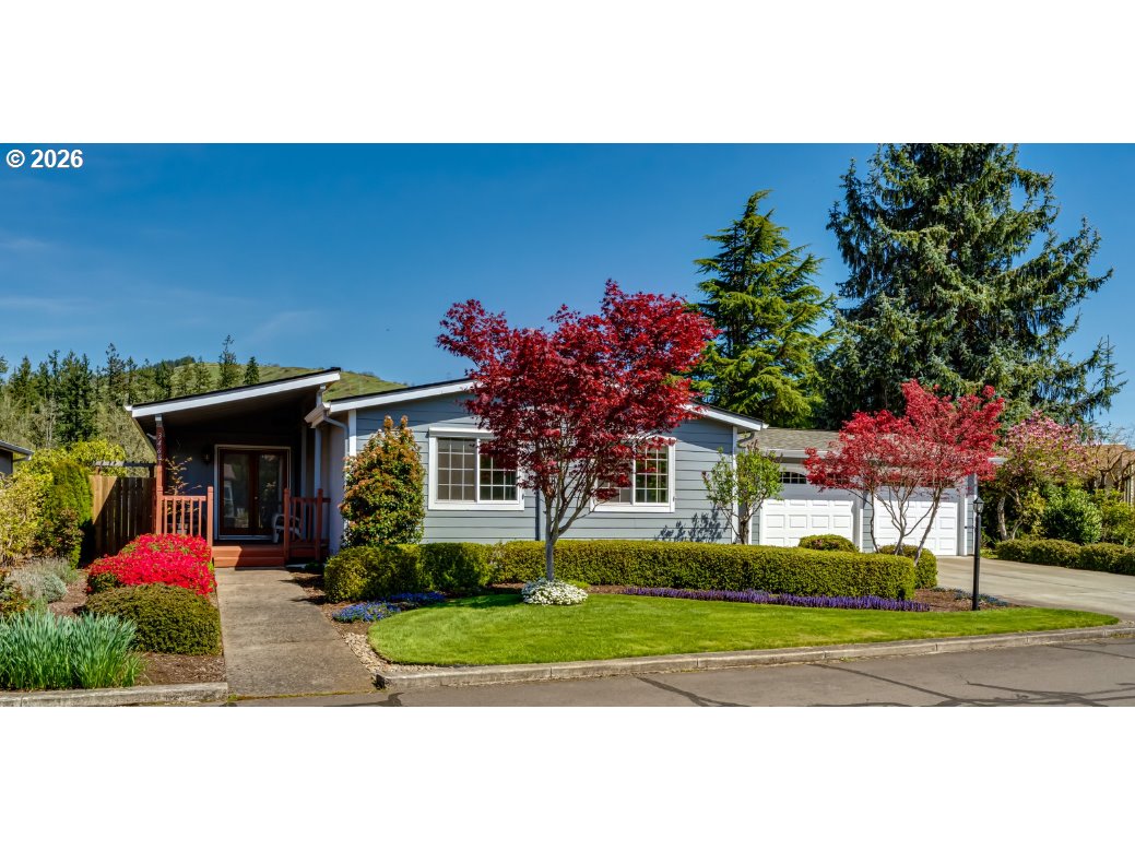 34681 Devonshire Drive Eugene, OR 97405 - Photo 2 of 34 a front view of a house with yard
