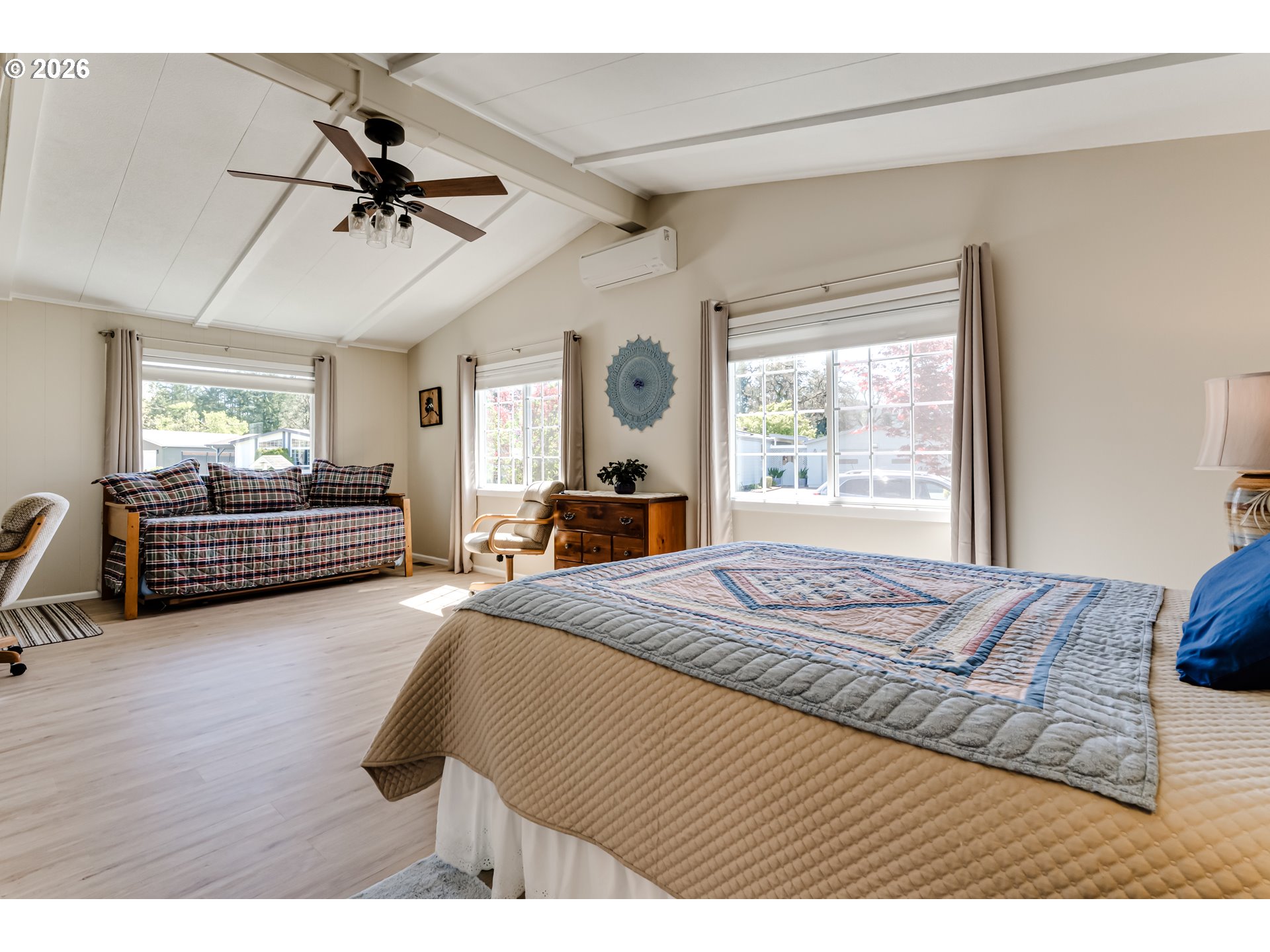 34681 Devonshire Drive Eugene, OR 97405 - Photo 21 of 34 a bedroom with a bed and window