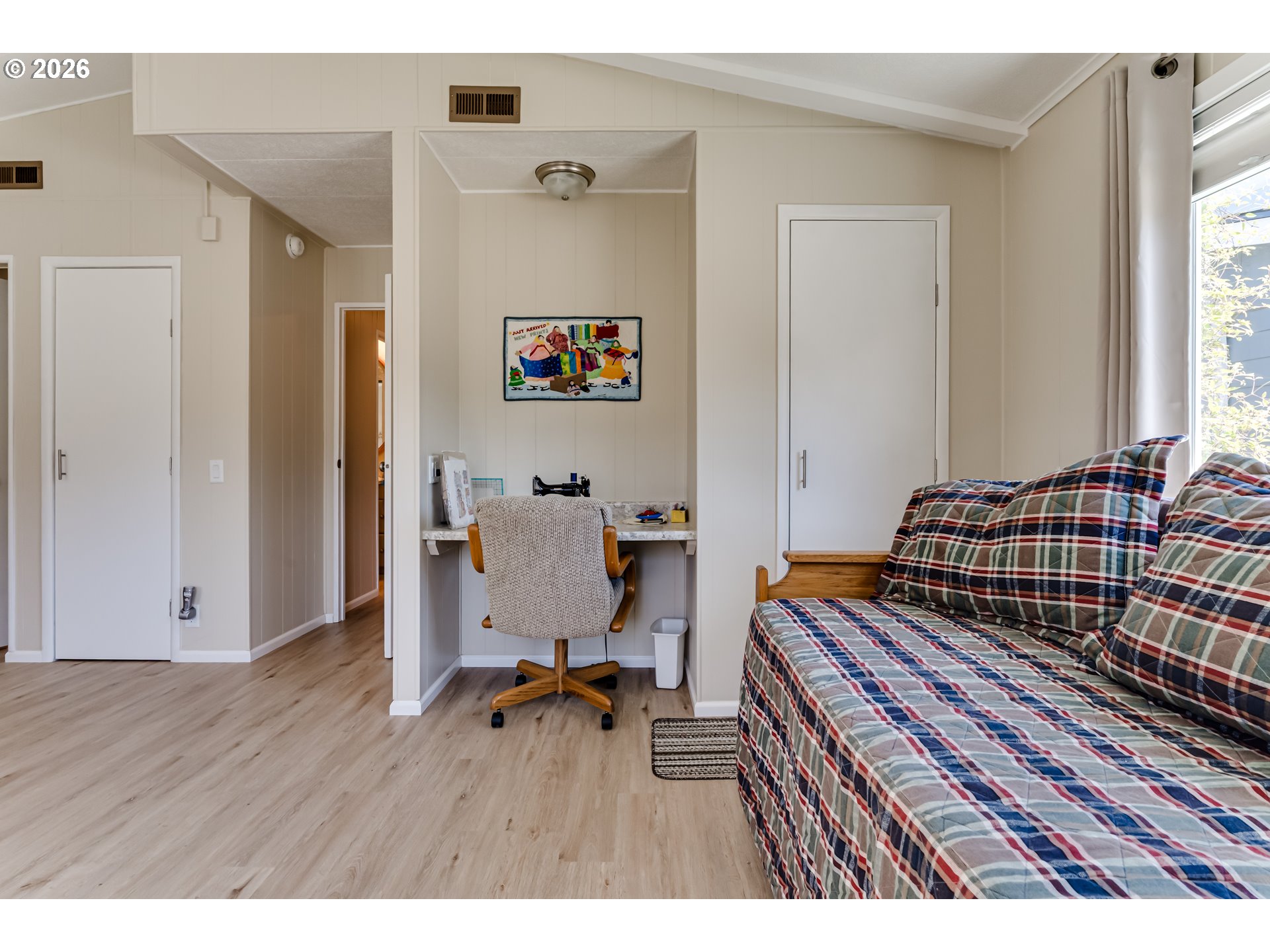 34681 Devonshire Drive Eugene, OR 97405 - Photo 22 of 34 a bedroom with a bed and wooden floor