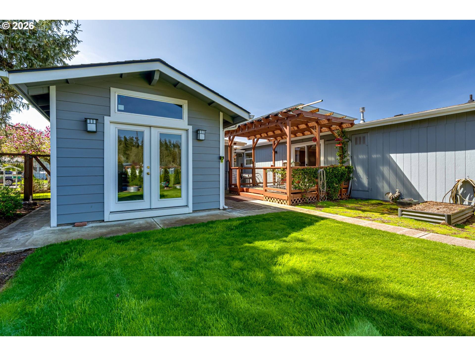 34681 Devonshire Drive Eugene, OR 97405 - Photo 28 of 34 a front view of a house with a yard