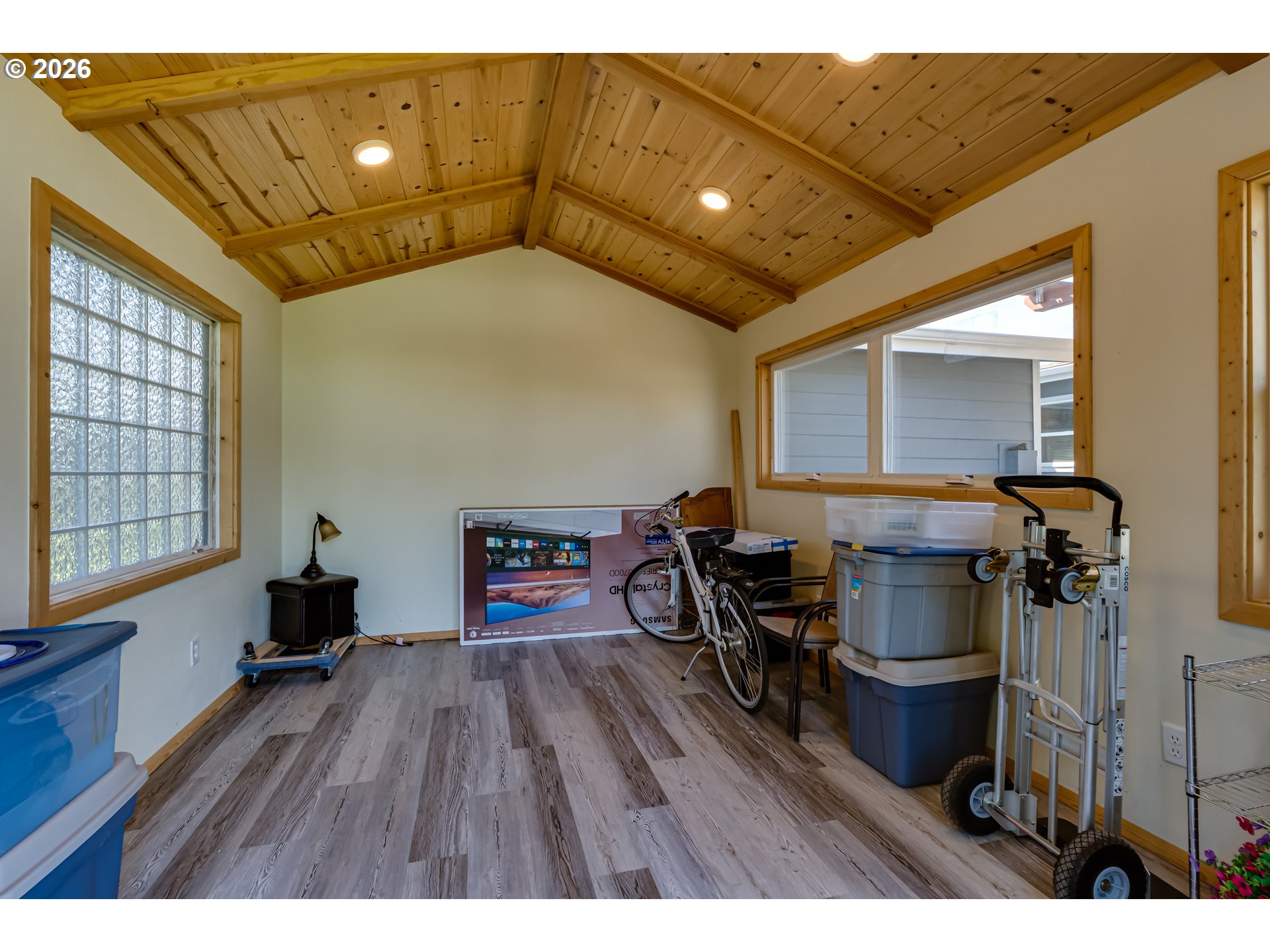34681 Devonshire Drive Eugene, OR 97405 - Photo 29 of 34 a living room with furniture and a wooden floor