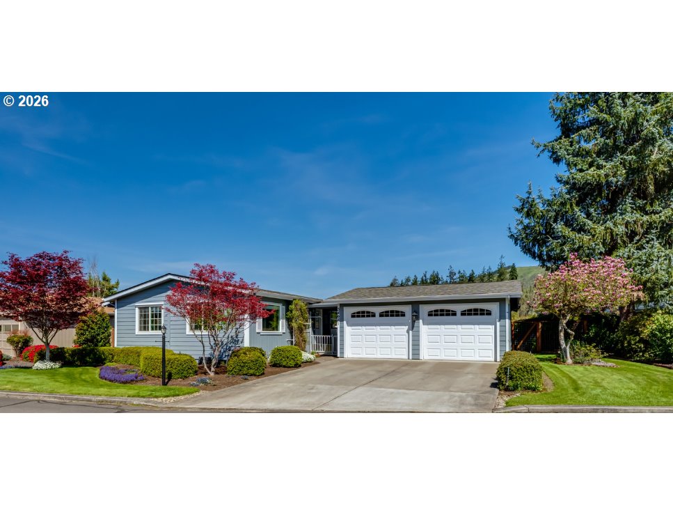 34681 Devonshire Drive Eugene, OR 97405 - Photo 3 of 34 a front view of a house with a yard