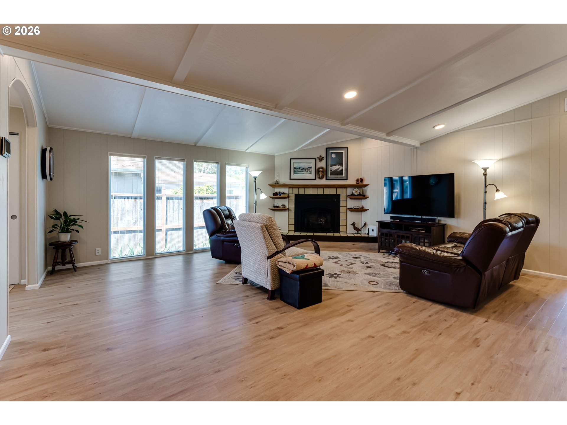 34681 Devonshire Drive Eugene, OR 97405 - Photo 6 of 34 a living room with furniture and a flat screen tv