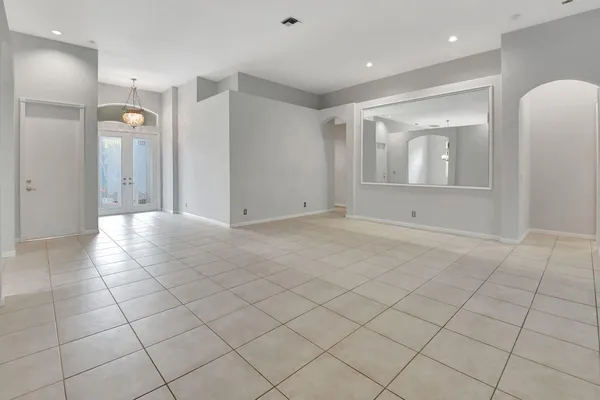 a view of an empty room and window