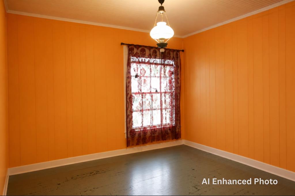 1500 Bonham Street Commerce, TX 75428 - Photo 22 of 29 a view of a room with window and wooden floor