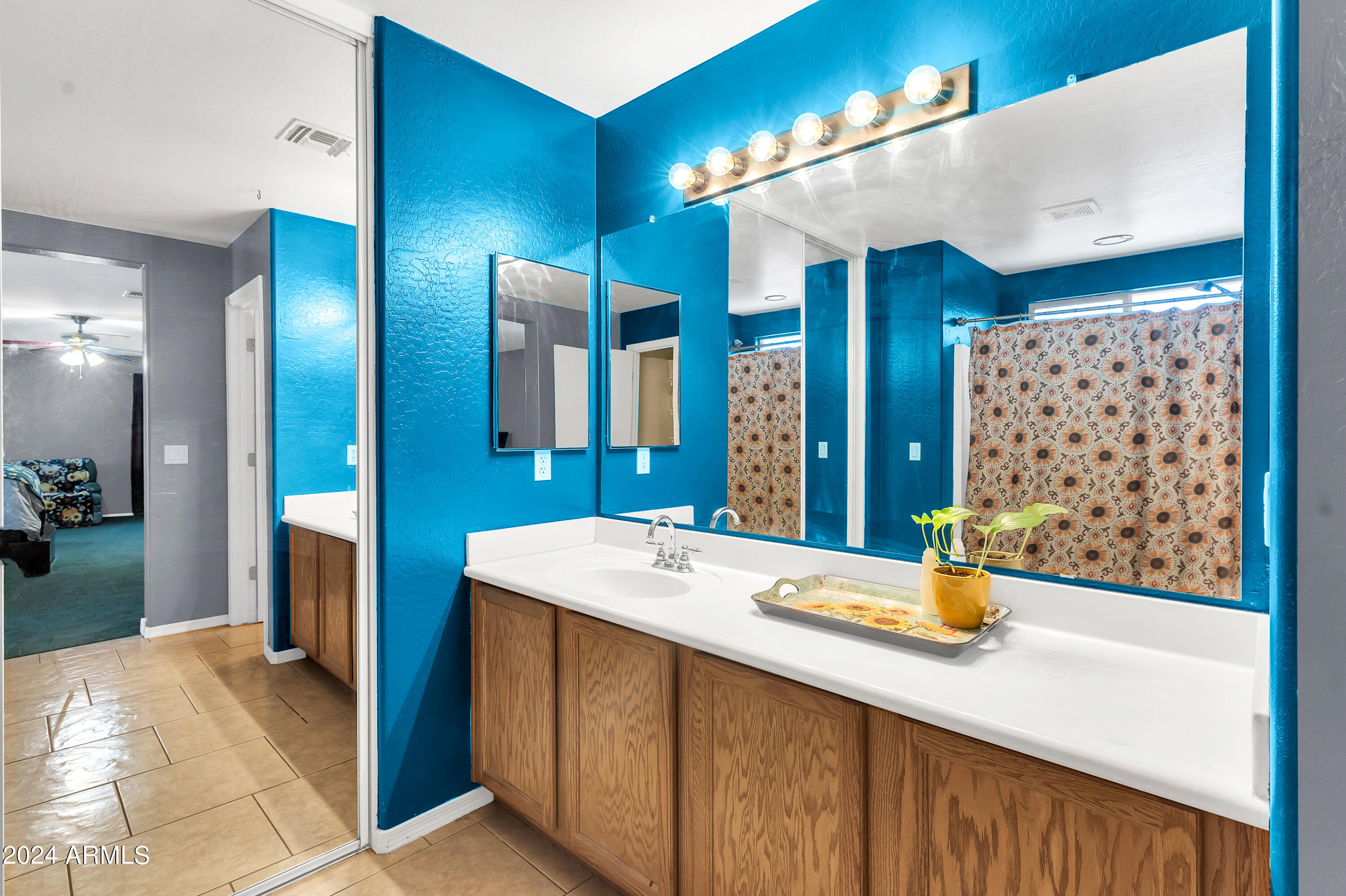 1215 West Ocotillo Street Coolidge, AZ 85128 - Photo 17 of 29 a bathroom with a sink double vanity and a mirror