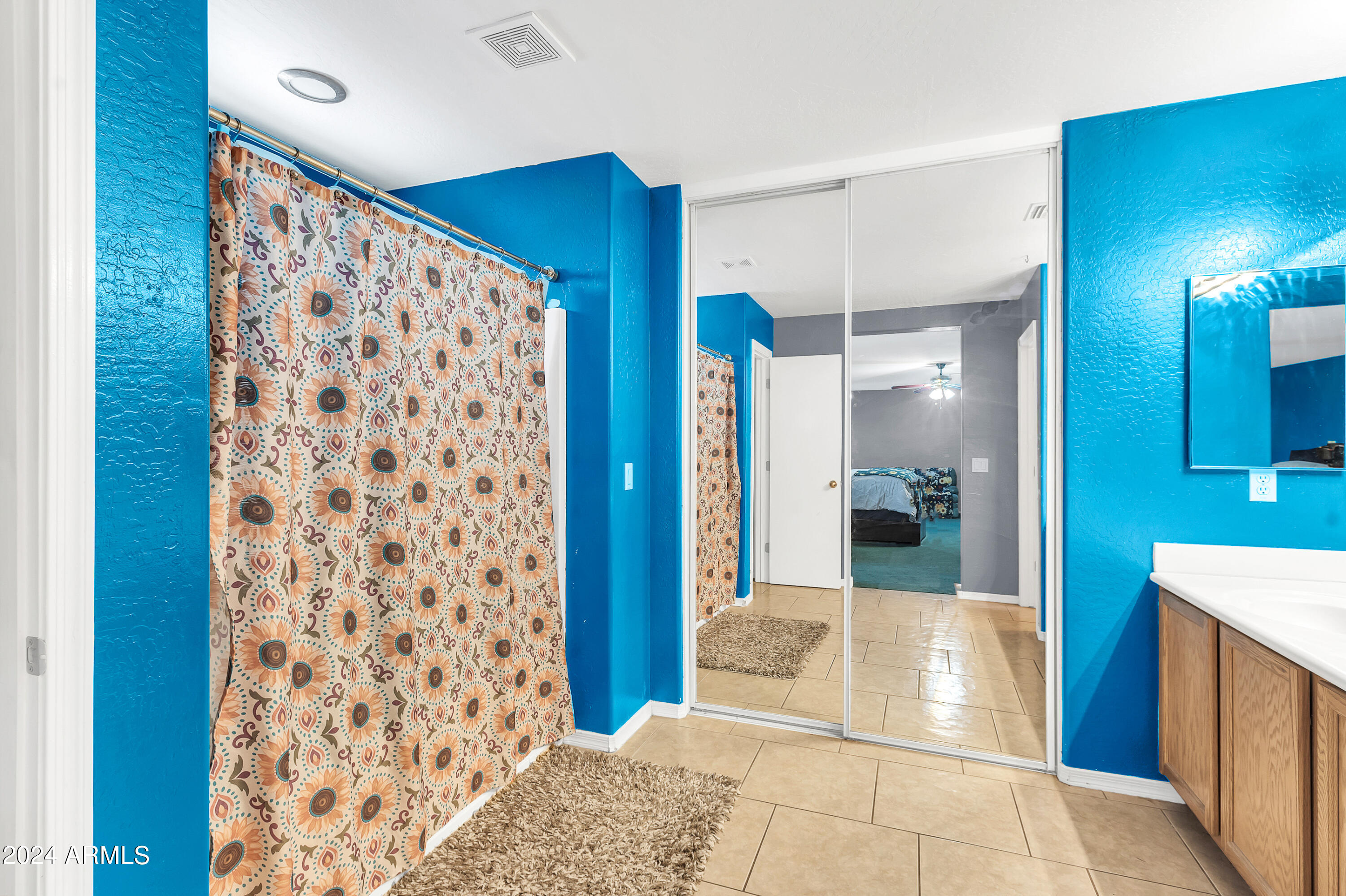1215 West Ocotillo Street Coolidge, AZ 85128 - Photo 18 of 29 a bathroom with a bathtub and a shower