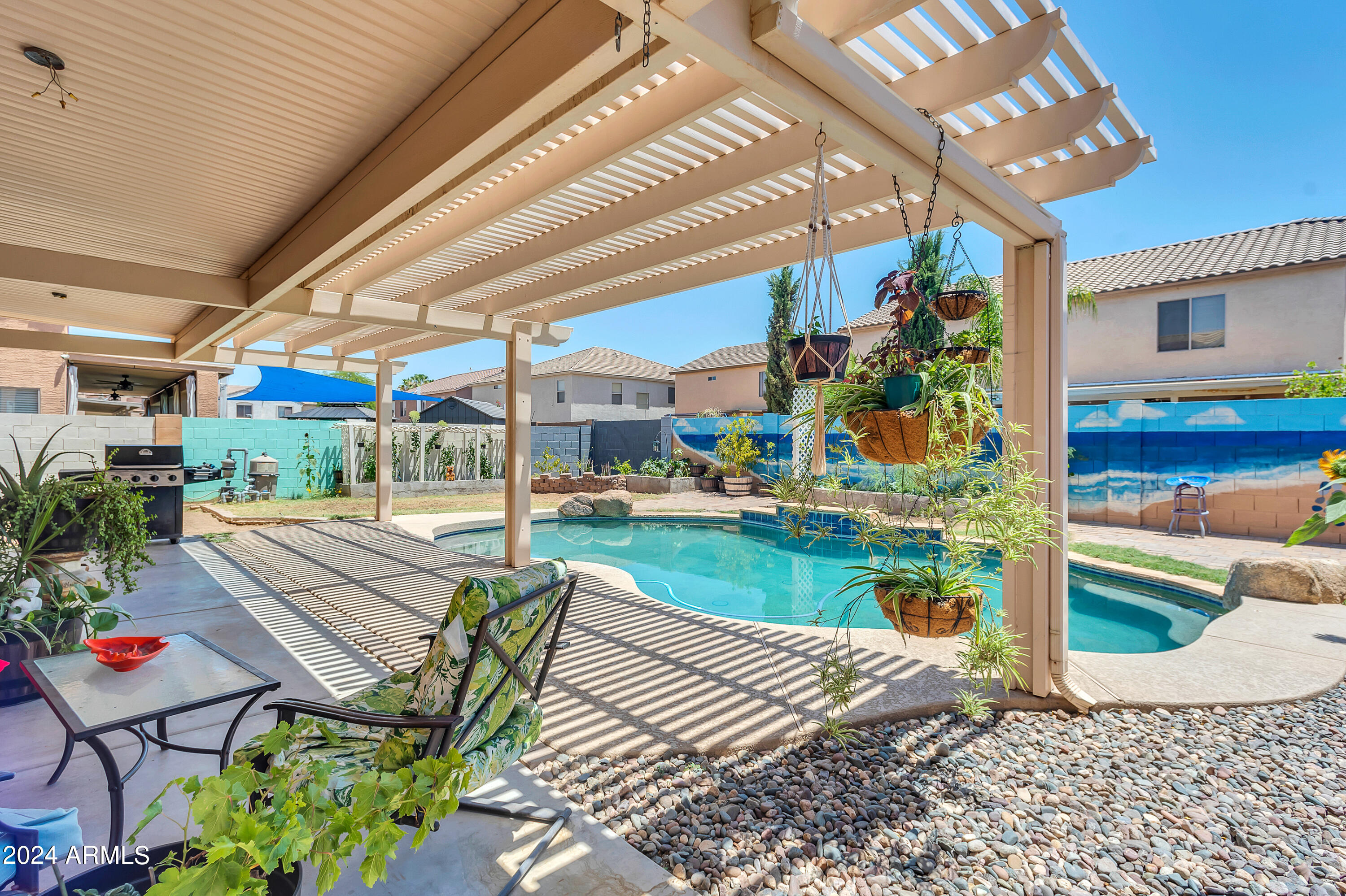 1215 West Ocotillo Street Coolidge, AZ 85128 - Photo 3 of 29 a view of swimming pool with outdoor seating and a patio