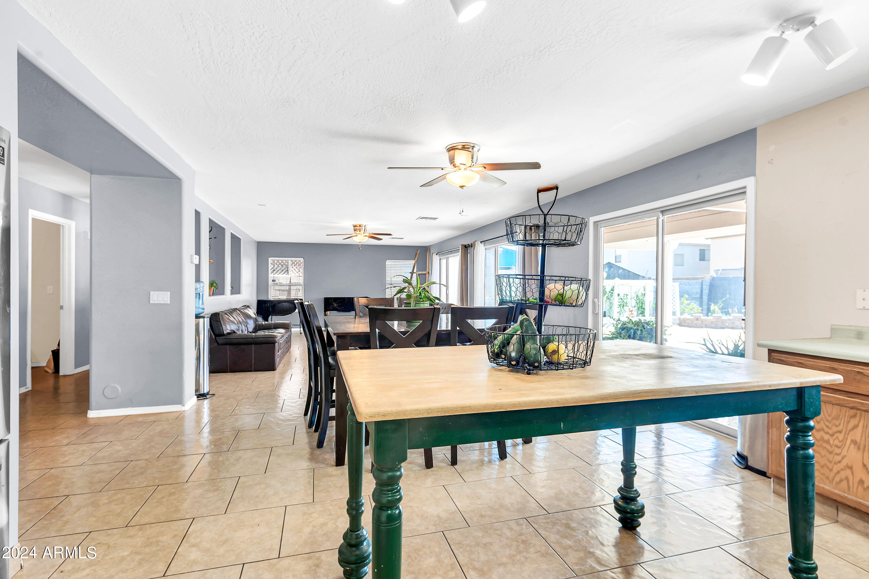 1215 West Ocotillo Street Coolidge, AZ 85128 - Photo 8 of 29 a view of a dining room with furniture and window
