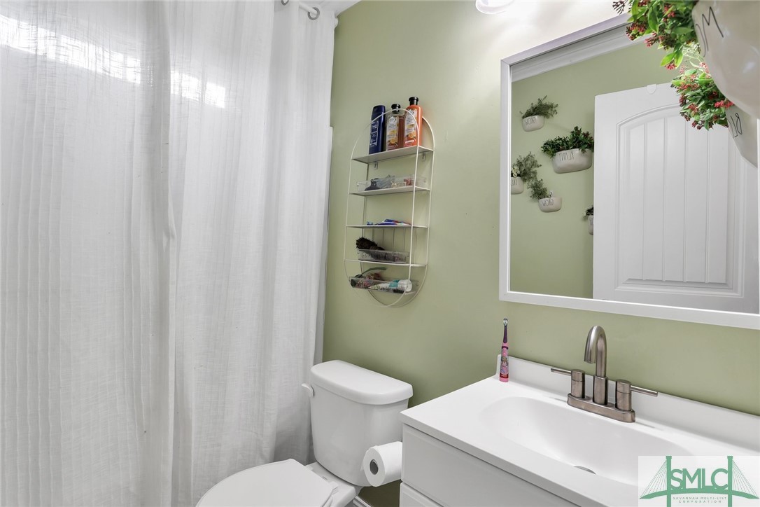 101 Red Fern Court Springfield, GA 31329 - Photo 22 of 40 Bath 1 located off kitchen in hallway w/ bed 1&2