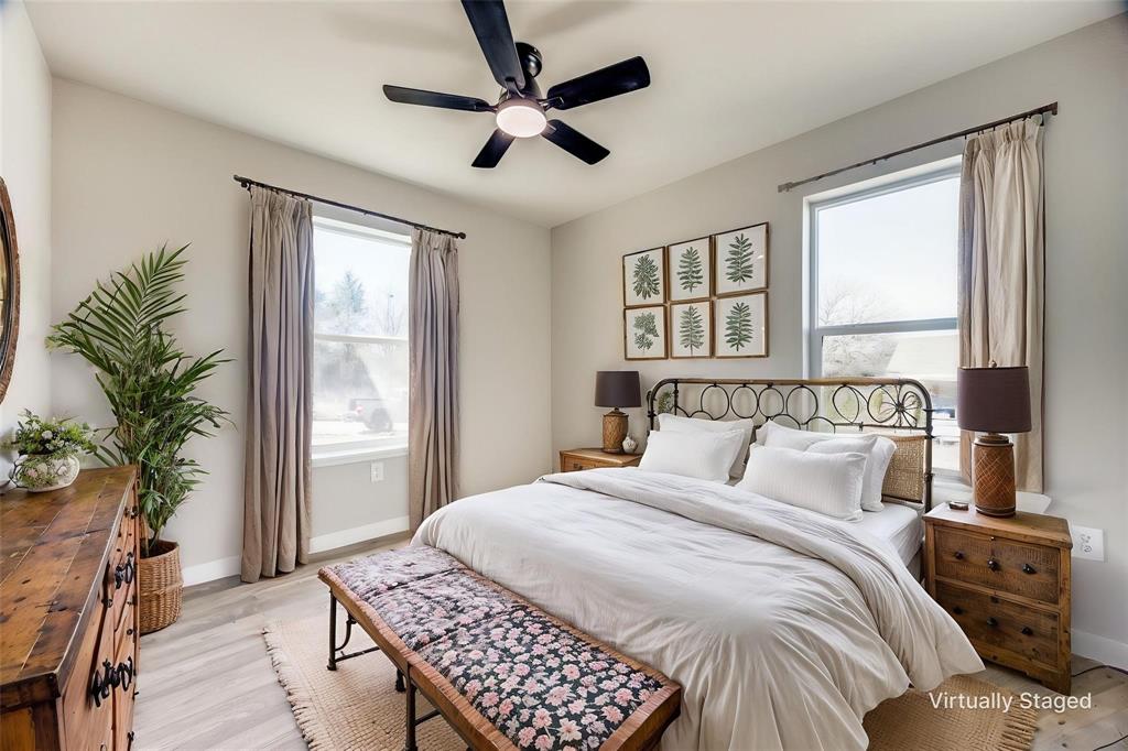 224 West Cardinal Street Ector, TX 75439 - Photo 4 of 7 a bedroom with a large bed and a window