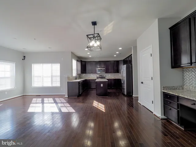 a view of a livingroom with furniture a fireplace