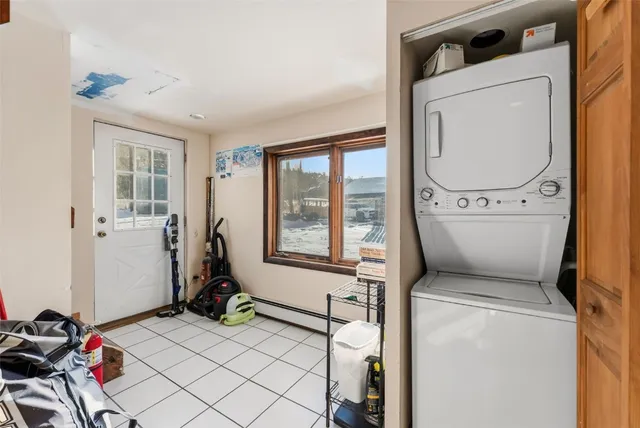 a bedroom with bed and a window