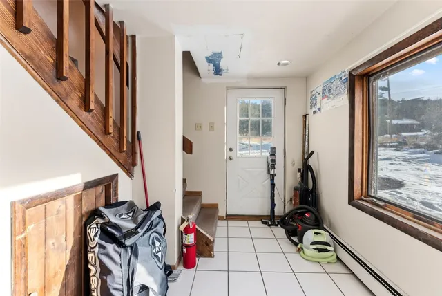 a bedroom with a bed and a desk