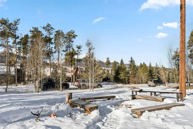 a bathroom with a sink a mirror and a toilet