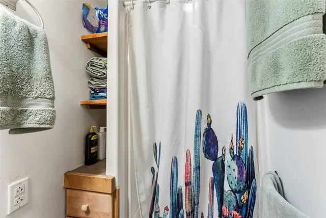 an aerial view of residential building and parking space